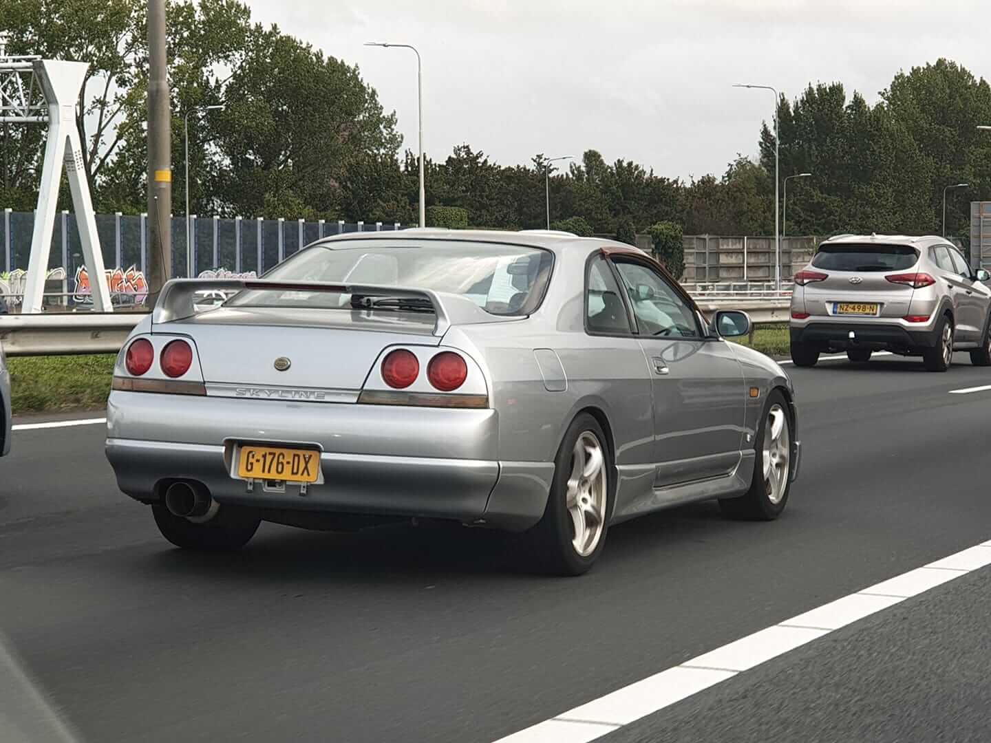 G-176-DX: NISSAN SKYLINE GTS uit 1997